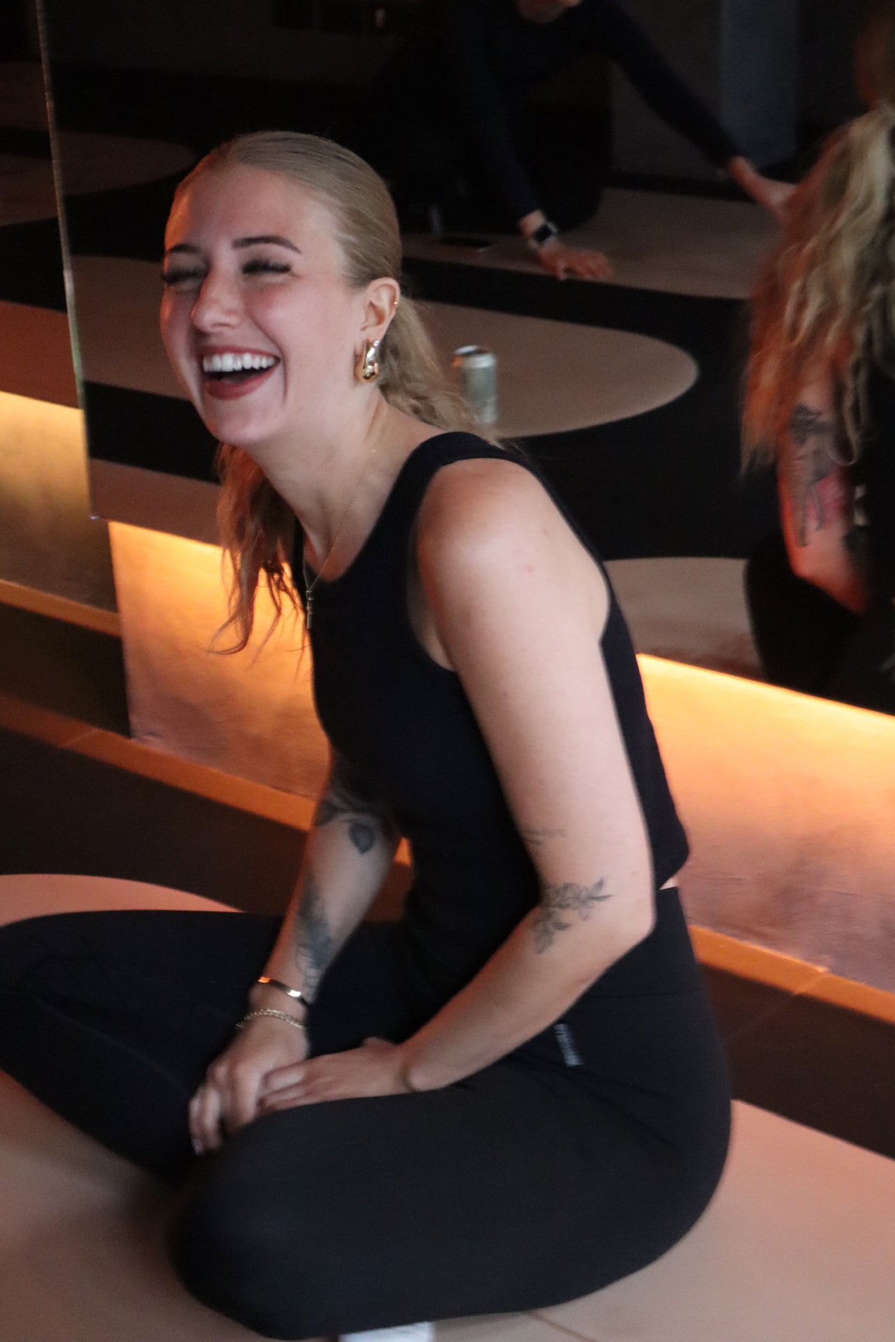 Member laughing during a Women's Wellness Club class